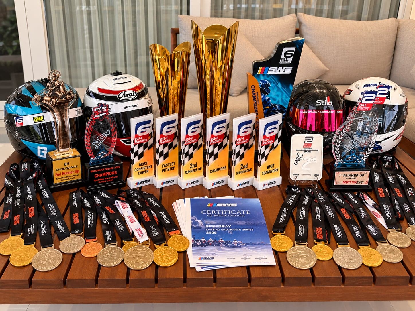 Spark Racing's trophies, medals and race helmets from the 2024 and 2025 endurance seasons